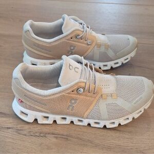 On Running Cream and Tan Sneakers